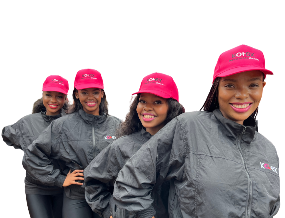 Kim Whalley - Founder, 9 Yard Marketing Kim Whalley, founder of 9 Yard Marketing, standing in front of glowing neon rings.