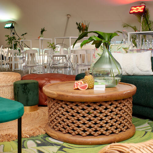 9 Yard Marketing - Events 9 Yard Marketing event setup with lounge seating and styled bar area.