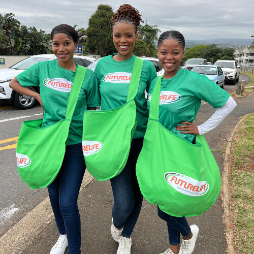 9 Yard Marketing - OOH Sampling 9 Yard Marketing out-of-home sampling team engaging passers-by.